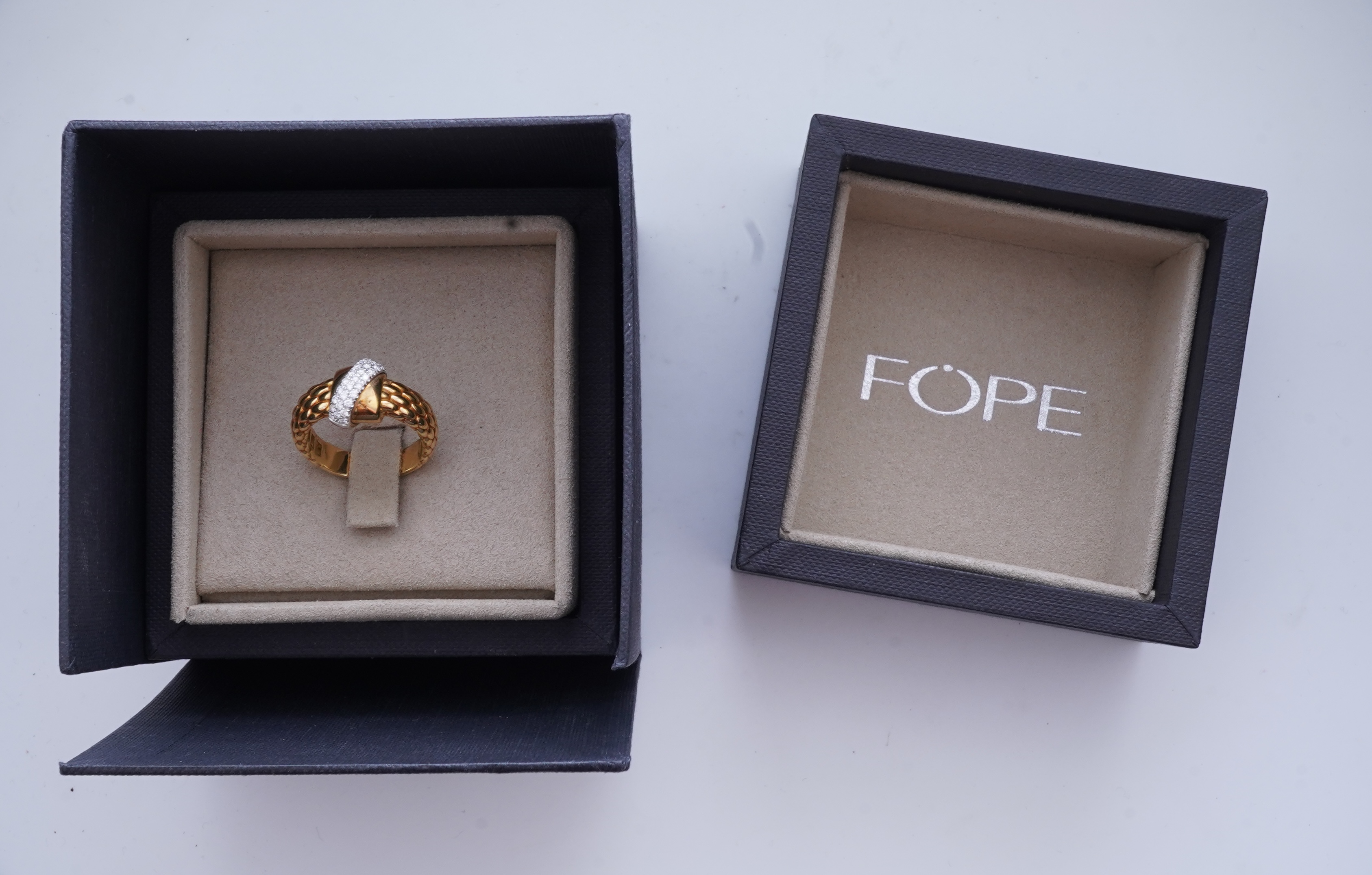 FOPE, a gold and diamond ring